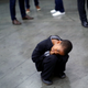Boy rests in a squat